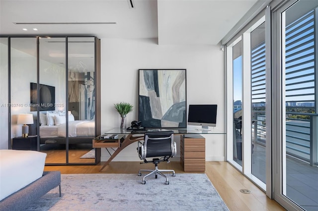 4701 N Meridian Ave Unit 603, Miami Beach, FL 33140 - home office with wood finished floors, a wealth of natural light, and expansive windows