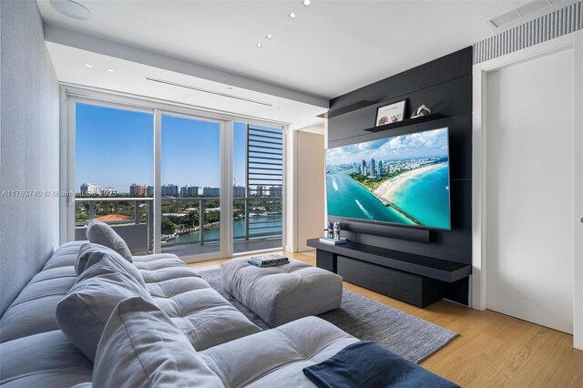 4701 N Meridian Ave Unit 603, Miami Beach, FL 33140 - home theater with visible vents and wood finished floors