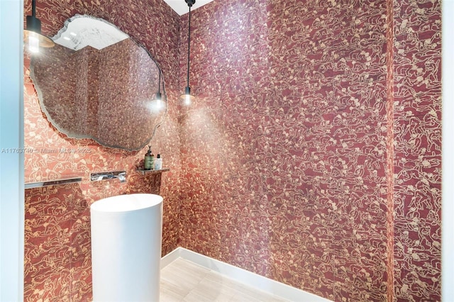 4701 N Meridian Ave Unit 603, Miami Beach, FL 33140 - bathroom featuring baseboards