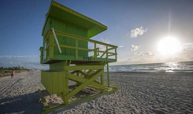 exterior space featuring a beach view