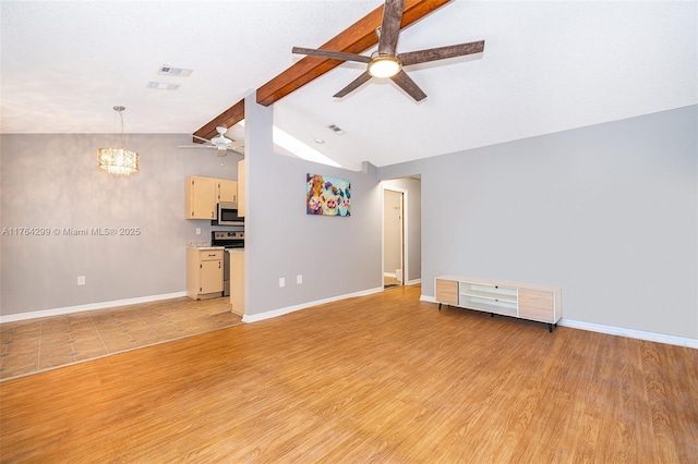 unfurnished living room with visible vents, baseboards, lofted ceiling with beams, light wood-style floors, and a ceiling fan