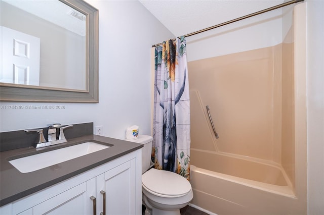 full bathroom featuring vanity, toilet, visible vents, and shower / bath combo