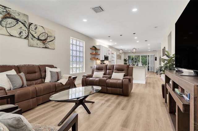 84 Belle Grove Ln, Royal Palm Beach, FL 33411 - living area with recessed lighting and light wood-style floors