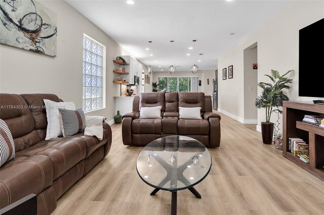 84 Belle Grove Ln, Royal Palm Beach, FL 33411 - living room featuring light wood-style flooring, baseboards, and recessed lighting