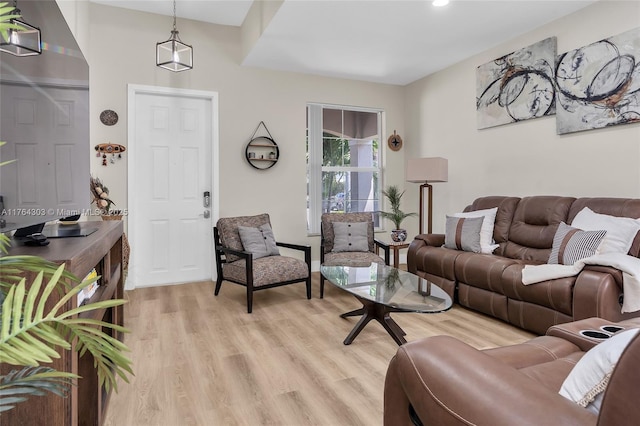 living area featuring light wood-style flooring