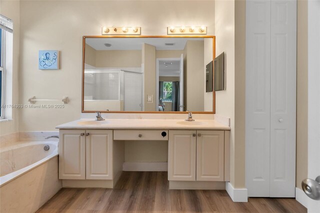 84 Belle Grove Ln, Royal Palm Beach, FL 33411 - full bathroom with a closet, double vanity, a stall shower, and a bath