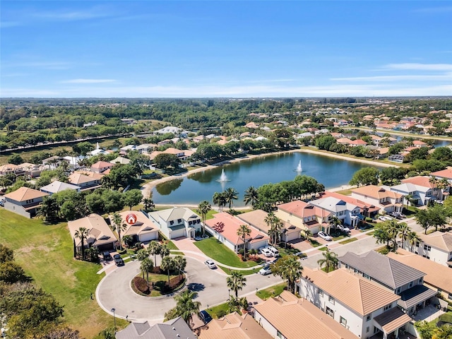 birds eye view of property with a residential view and a water view