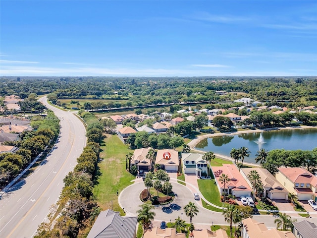 birds eye view of property with a residential view and a water view