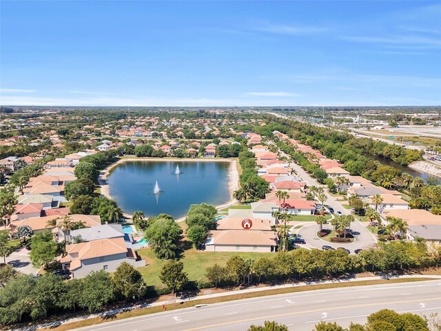 aerial view featuring a residential view and a water view