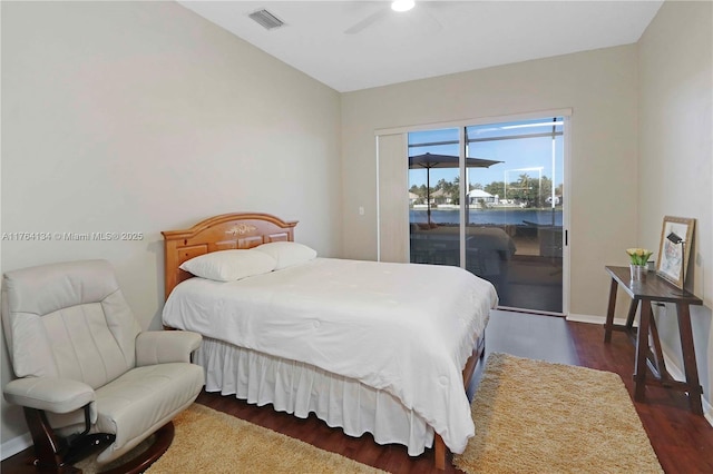 bedroom with visible vents, a ceiling fan, access to outside, dark wood finished floors, and baseboards