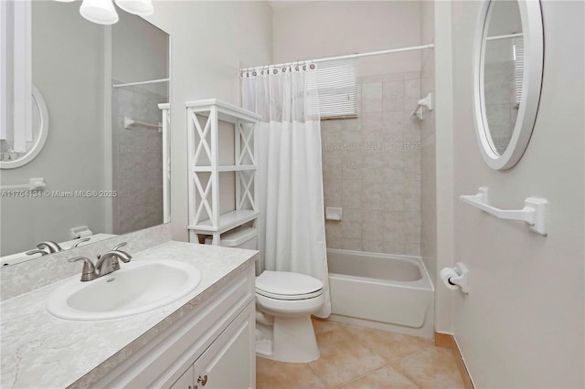 full bath with tile patterned flooring, vanity, toilet, and shower / tub combo with curtain