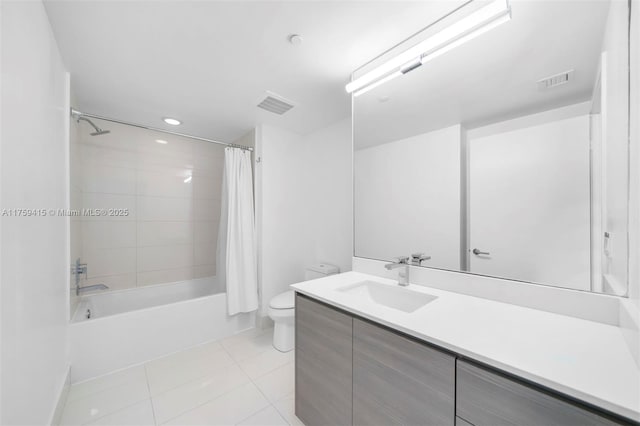 full bathroom featuring vanity, shower / bathtub combination with curtain, visible vents, tile patterned floors, and toilet