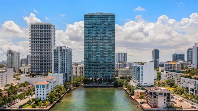 property's view of city featuring a water view