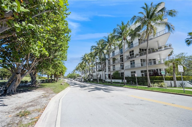 view of street with curbs