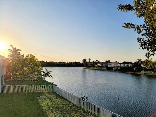 water view featuring fence