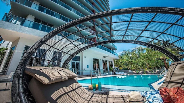 pool featuring a patio area