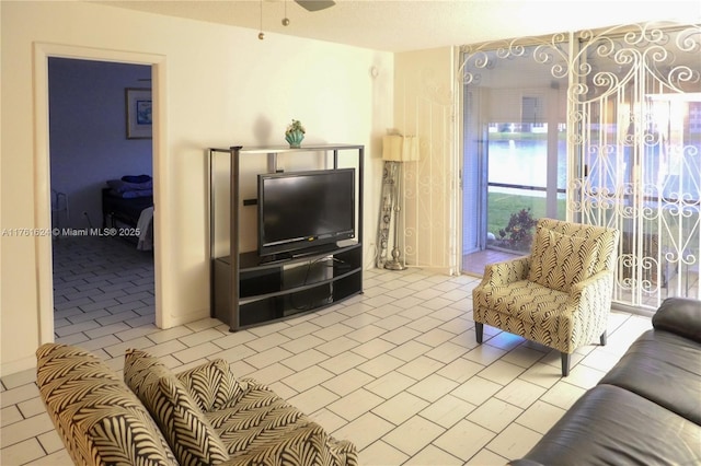 living room with ceiling fan