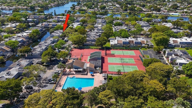 birds eye view of property featuring a water view