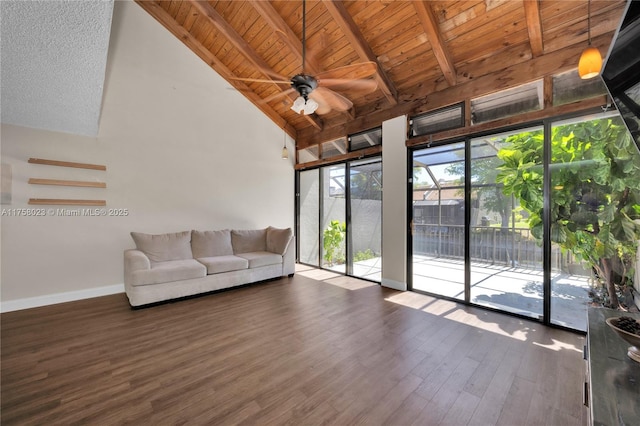 unfurnished sunroom with wood ceiling, lofted ceiling with beams, and a ceiling fan