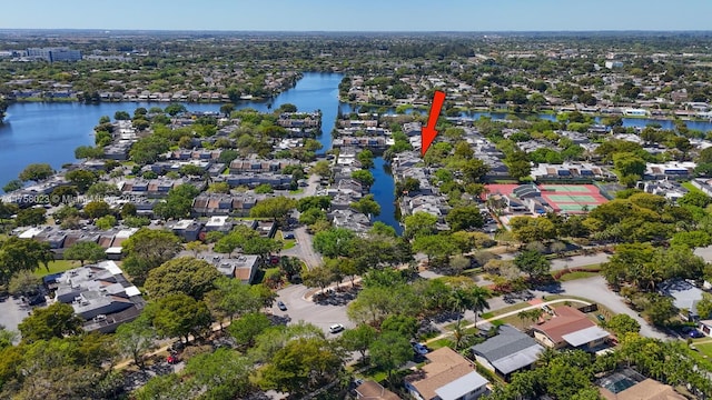 bird's eye view featuring a residential view and a water view