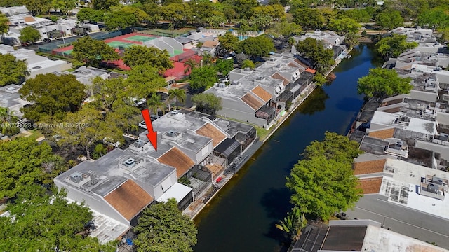 bird's eye view featuring a residential view and a water view