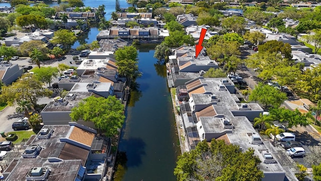 birds eye view of property featuring a residential view and a water view