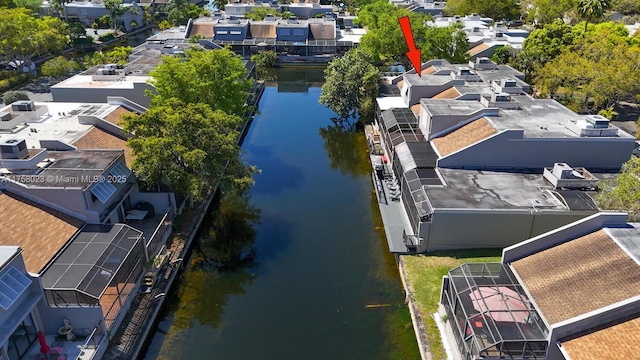 birds eye view of property featuring a residential view and a water view