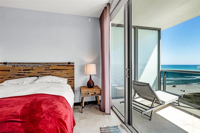 bedroom with floor to ceiling windows