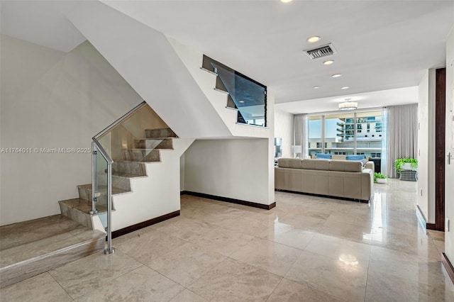 stairs featuring recessed lighting, baseboards, and visible vents