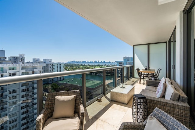 balcony featuring a city view