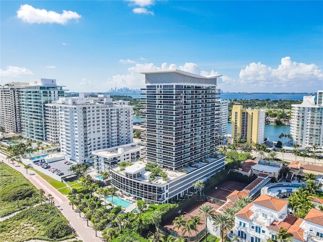 aerial view featuring a view of city and a water view