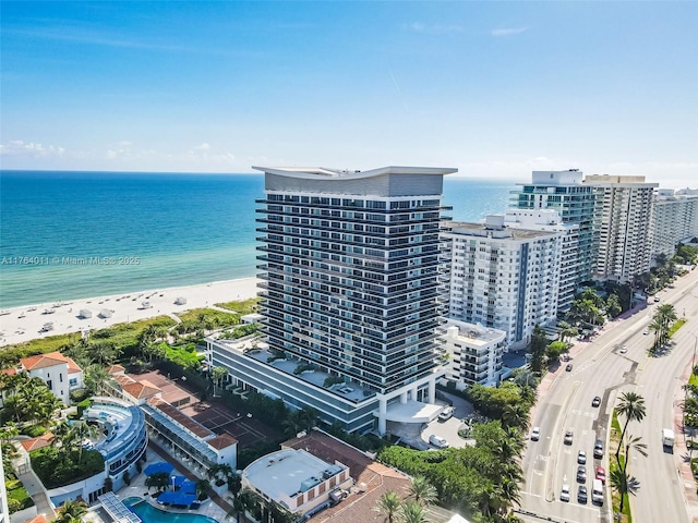 bird's eye view featuring a water view and a view of city