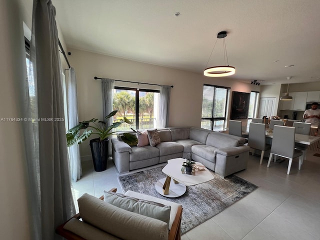 living area with light tile patterned floors