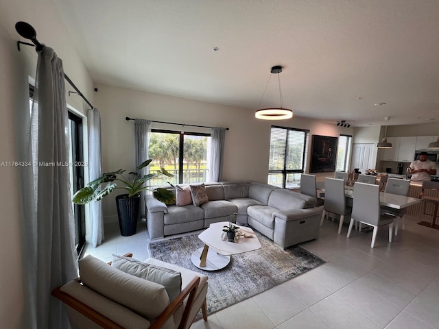 living room featuring light tile patterned floors