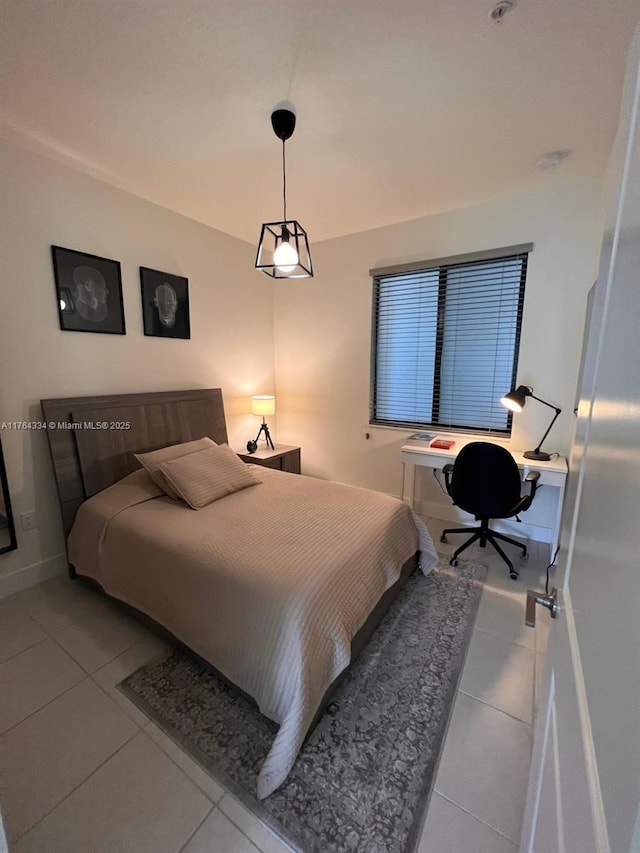 tiled bedroom with baseboards