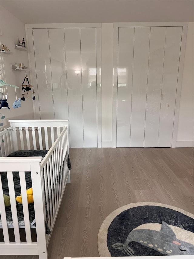 bedroom with wood finished floors