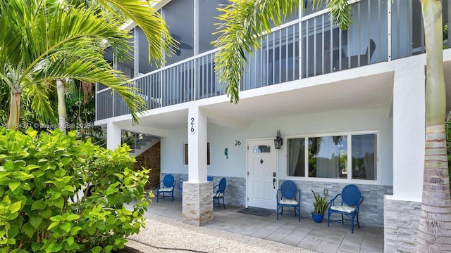 view of patio / terrace with stairway