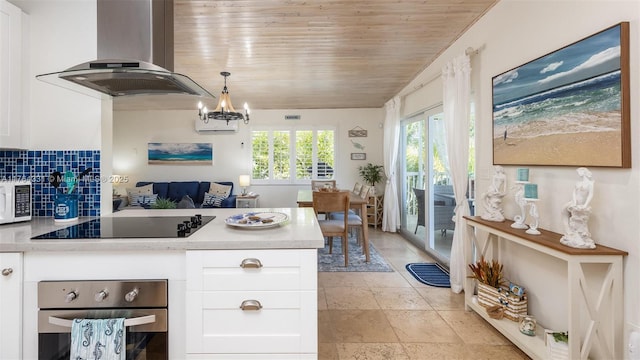 kitchen featuring ventilation hood, light countertops, white cabinetry, stainless steel oven, and black electric cooktop