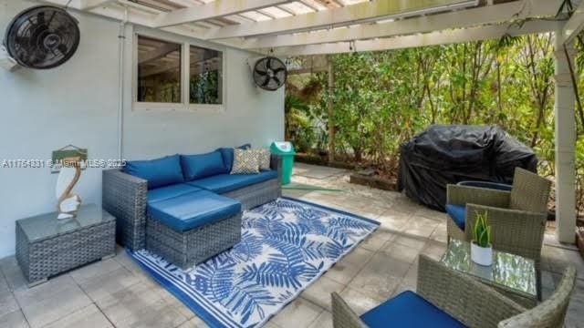 view of patio with an outdoor living space