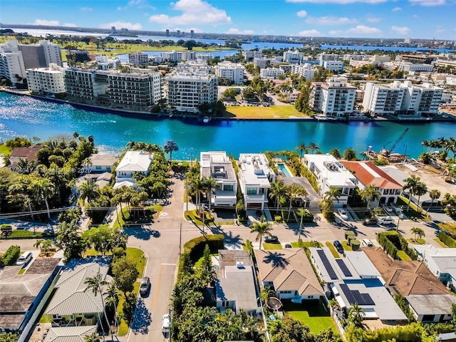 aerial view featuring a water view and a view of city