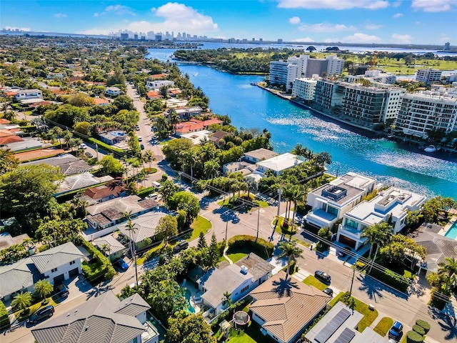 bird's eye view featuring a view of city and a water view