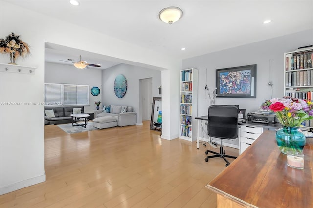 office area with recessed lighting, light wood-type flooring, baseboards, and ceiling fan