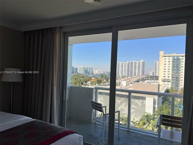 bedroom featuring a view of city