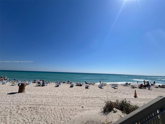 view of water feature with a beach view