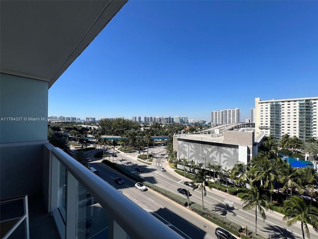 balcony featuring a city view