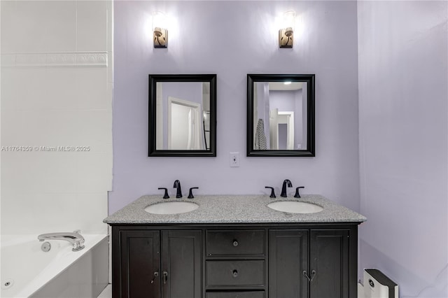 bathroom featuring a sink, a bath, and double vanity