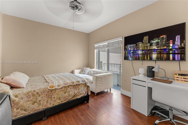 bedroom with access to exterior, ceiling fan, and wood-type flooring