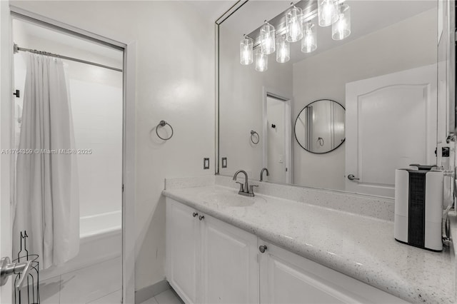 bathroom featuring shower / tub combo with curtain and vanity