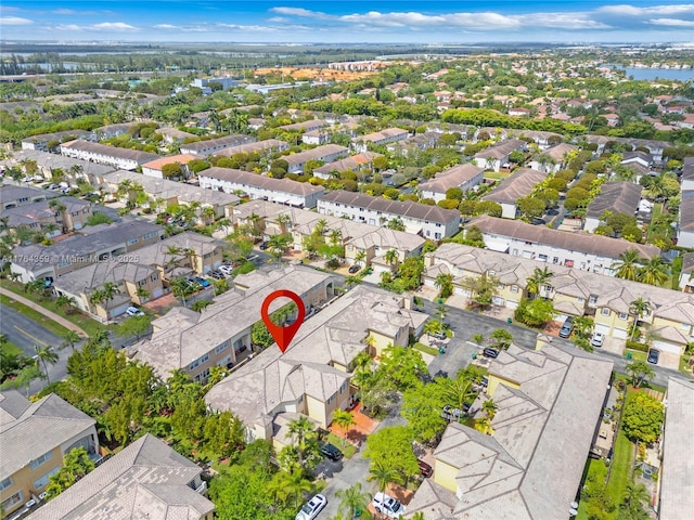 aerial view with a residential view and a water view