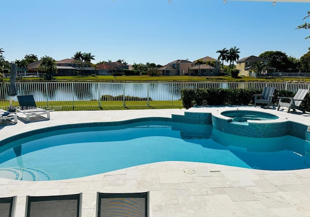 view of pool featuring a patio area, a fenced backyard, a water view, and a residential view